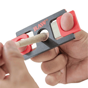 demonstrating how a raw cutter works